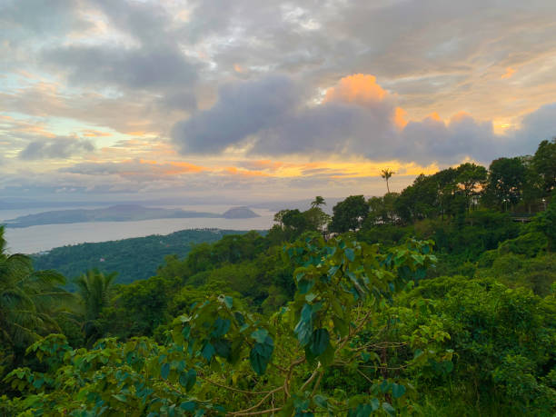 istock taal volcano in the sunset with the forest view 2188988545