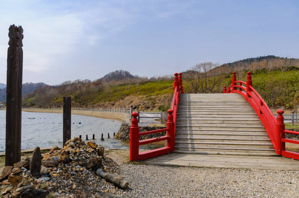 istock Red drum bridge at Sanzu River, Osorezan, Aomori 2188990051