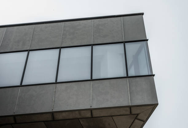 istock fragment of concrete gray building with empty windows 2188990481