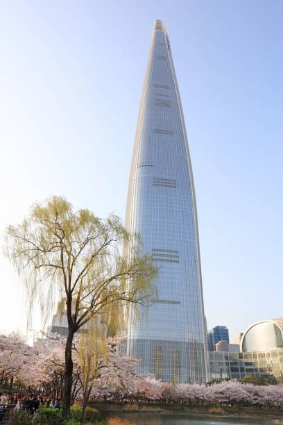 istock Lotte World Tower with cherry blossoms in Seoul. 2188990814