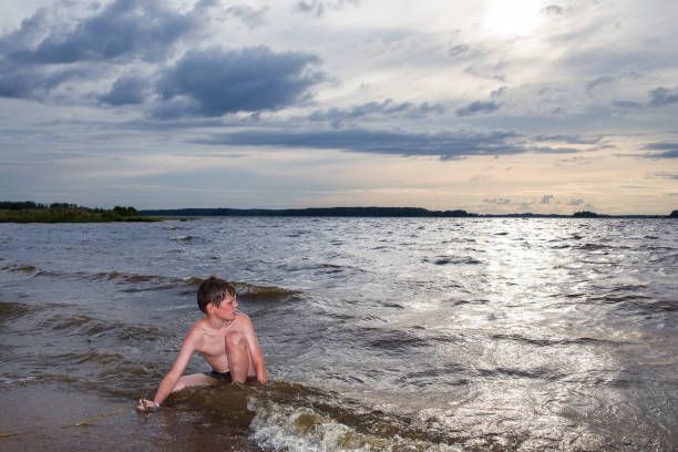 istock A boy swims in the sea 2188991016