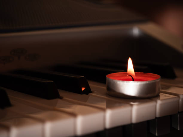 istock Candles with piano organ musical instrument background 2188991201