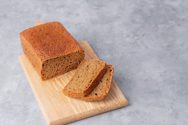 istock Homemade sourdough bread on neutral grey background with copy space 2188991444