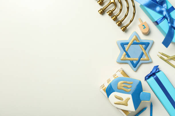 istock Gingerbread cookies, gift boxes and Hanukkiah on white background, space for text 2188992629