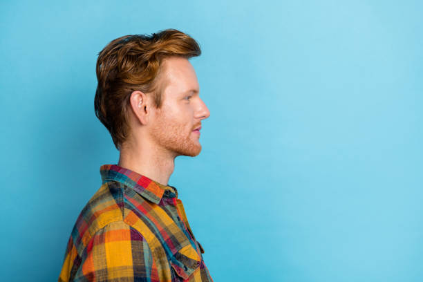 istock Profile photo of young confident guy serious influencer success looking empty space isolated on blue color background 2188994589