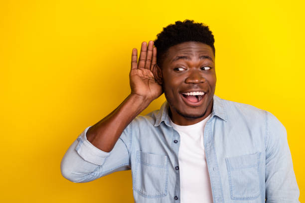 istock Photo of positive guy interested incredible discount message look empty space hear isolated vibrant color background 2188995231