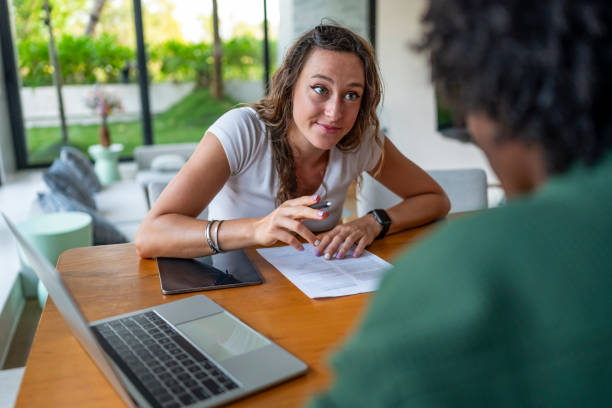 istock Two People Discussing Business Ideas in a Modern Office Setting 2188995862