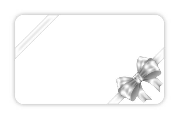 istock Mockup white gift card with two diagonal silver ribbon and bow isolated on white background 2188997601