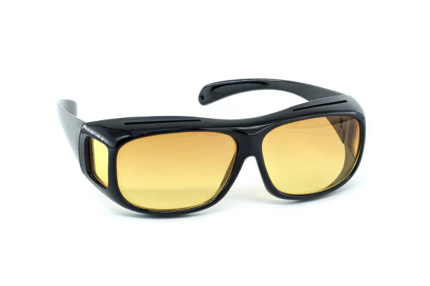istock Stylish Black Sunglasses With Yellow Lenses on White Background 2188998037