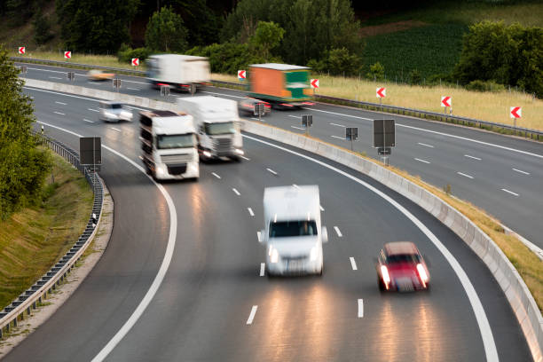 istock Trucks Speeding on Highway, Heavy Goods Transportation, Aerial View 2188998676