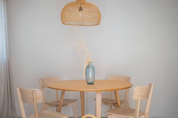 A Stylish and Minimalist Dining Area Adorned with Beautiful Natural Decor Elements