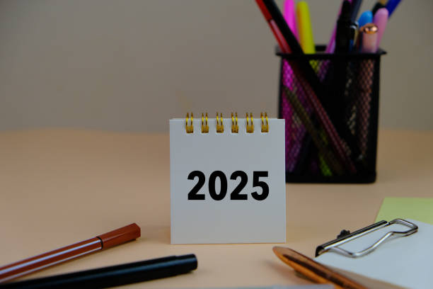 istock handwritten of 2025 BUDGET with hand element on notebook as a new year concept. 2189000507