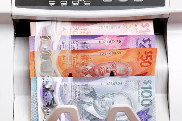 istock Barbadian dollar in the counting machine 2189001878