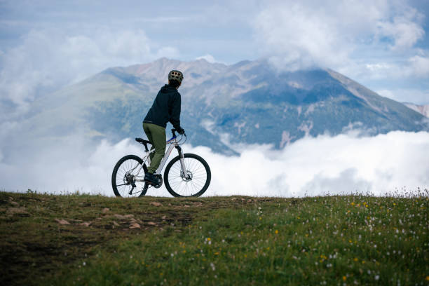 istock Riding mountain bike on beautiful mountain top 2189003436
