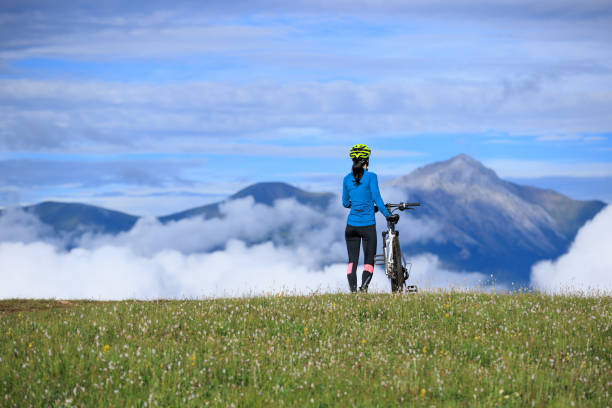 Riding mountain bike on beautiful mountain top