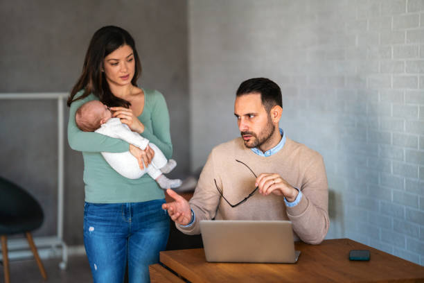 istock Stressed couple arguing and having marriage problems. Marriage difficulties, divorce concept. 2189004402