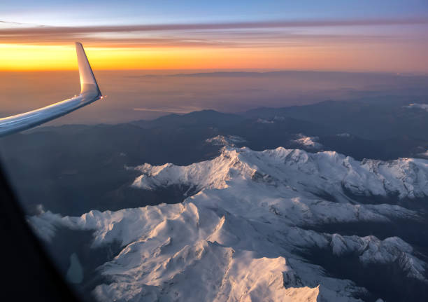 istock Airplane wing winglet at sunrise over Mont Blanc Alps 2189004716
