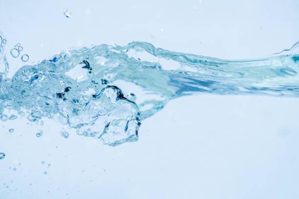 istock Water splash isolated on white background, Air Bubbles Float Up Under Blue Water. Pure Water Wave, Oxygen Relaxation. Blue bubbles Water Textured. 2189006586