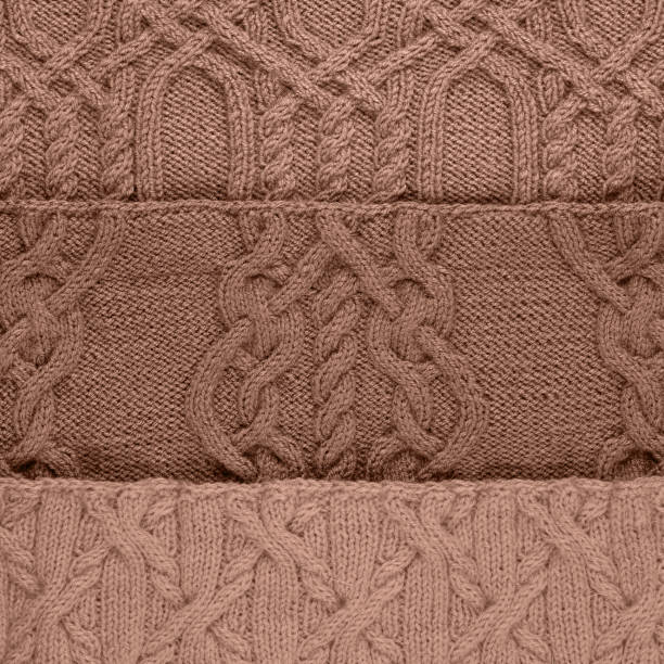 istock Knitted mocha mousse color background 2189007906
