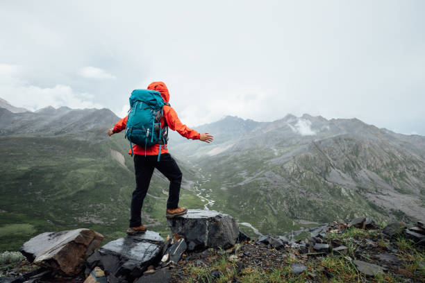 istock Hiking woman on high altitude mountain top 2189009238