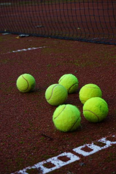 istock Tennis Balls on Clay Court 2189010906