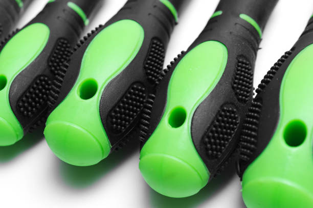 green plastic screwdriver handles on a white background.