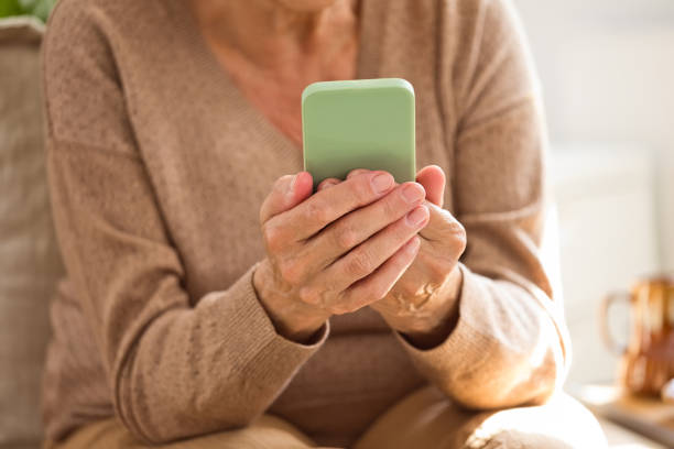 istock Senior woman using smart phone 2189011893