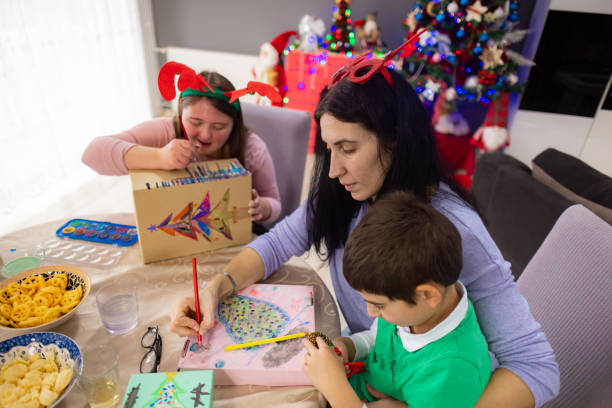 istock Autistic boy joining his family in a creative workshop 2189012500