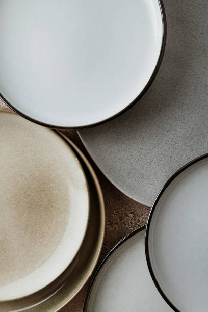 istock Top view of modern various ceramic plates on a kitchen table, cooking concept. 2189013587