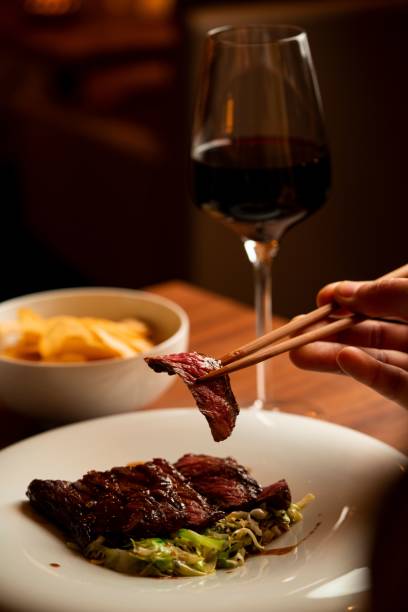 istock Gourmet dining with steak and wine 2189016054