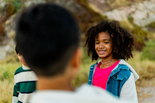 istock Child friends talking during summer camp outdoors 2189016158