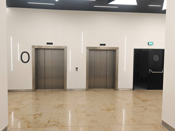 istock Emergency exit and elevator doors in shopping center of bus station 2189017683
