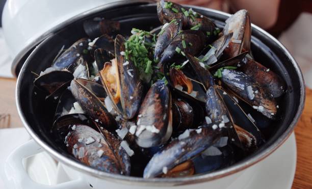 istock Steamed Mussels in Garlic White Wine Broth 2189021636