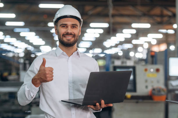 istock Laptop is in hands. Man is working in the modern factory 2189022677