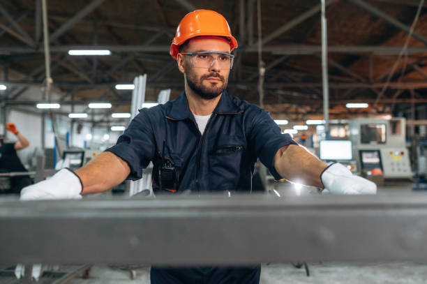 istock Professional mechanic or technician, standing. Man is working in the modern factory 2189022882