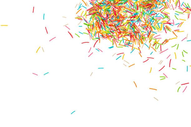 istock Sprinkle background. Colorful sprinklers. Decoration for cake, donut, bakery. Candy topping background isolated on white background 2189023533