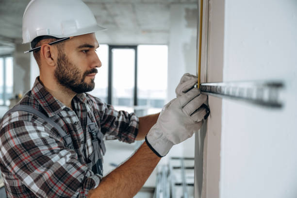 istock A man is renovating an unfinished room 2189025617