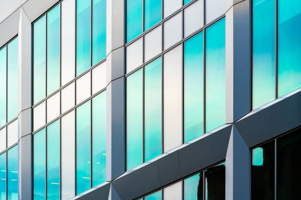 istock Modern Glass Facade with Reflective Panels and Angular Architectural Details in Urban Design 2189027703