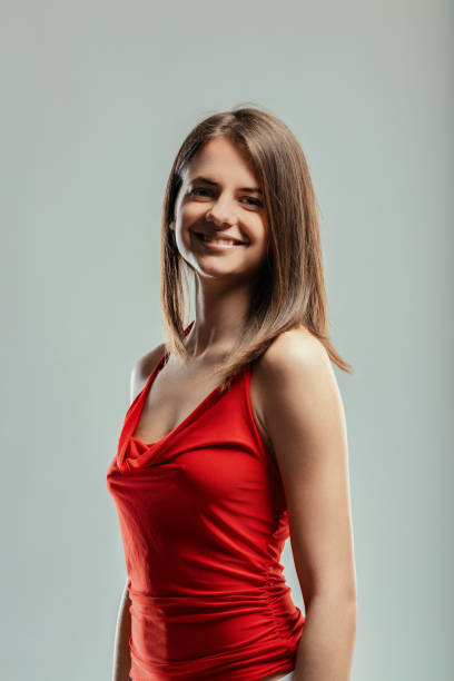 istock Young woman smiling and feeling good about herself 2189027855