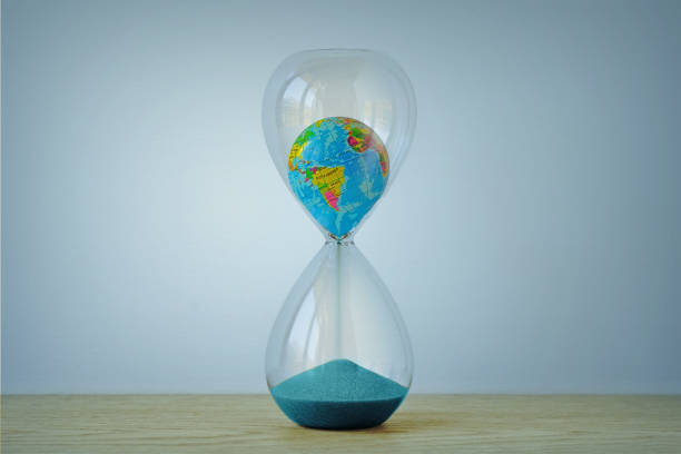 istock Earth planet in hourglass  - Ecology, global warming, climate change concept 2189028114