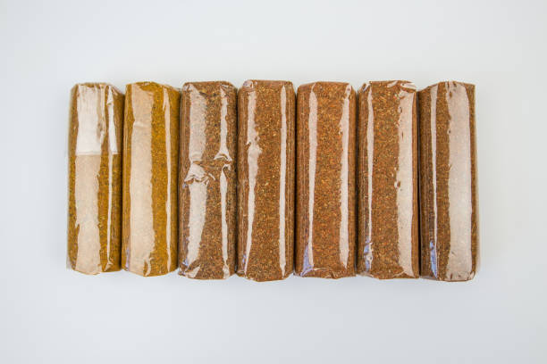 various spices and herbs packed in small transparent plastic bags isolated on white background
