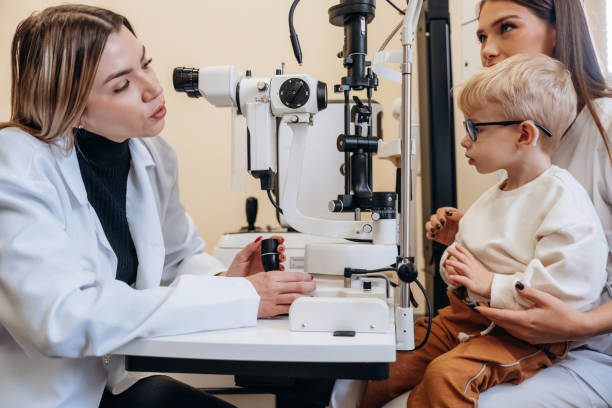 istock Mother with her son are in the clinic, checking vision 2189034550