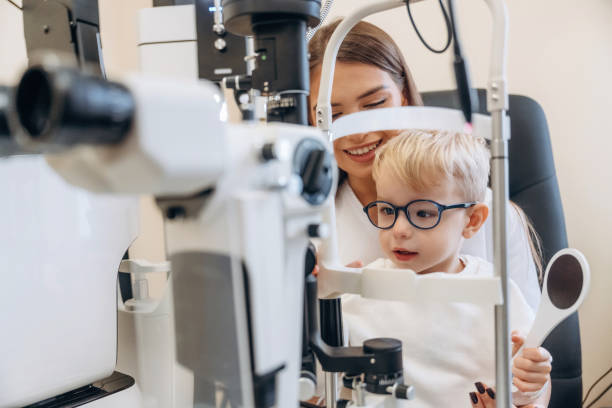 istock In the ophthalmologist cabinet. Little boy is having check up 2189034634