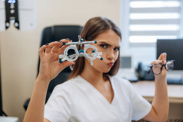 istock Young female ophthalmologist is in the cabinet 2189034914