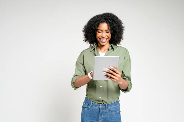 istock An engaging African-American woman using her tablet 2189036381