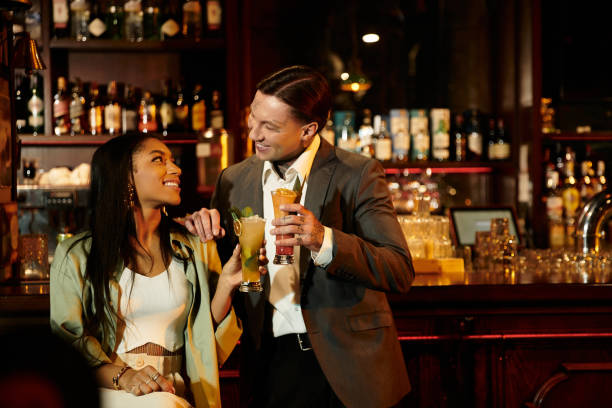 istock Multicultural couple enjoying a romantic date night at a cozy bar 2189037931