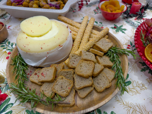 Image of varied food with cheeses, sweets and fruits