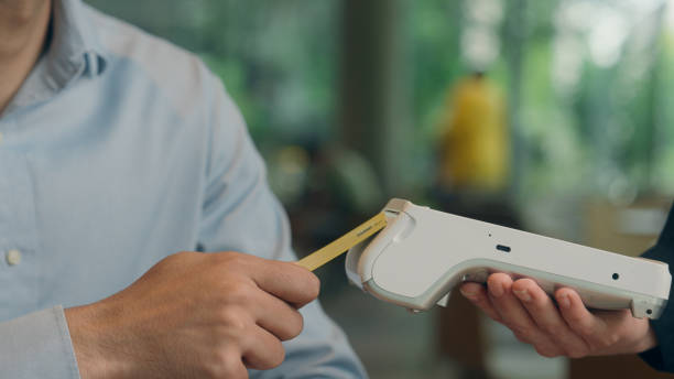 istock Customer pay food order lunch in cafe unrecognizable man contactless payment technology NFC on phone waiter serving visitor in restaurant male guy paying bank app mobile terminal scan cashless service 2189046918
