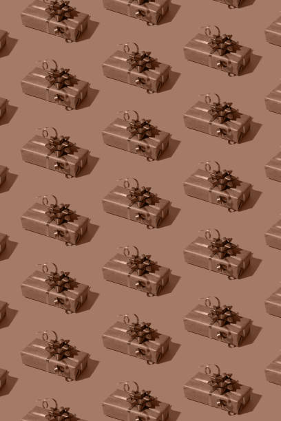 istock Pattern made from gift boxes mocha mousse trendy 2025 new year colour 2189047816