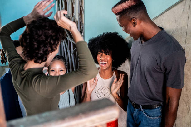istock Young friends talking at home 2189049164